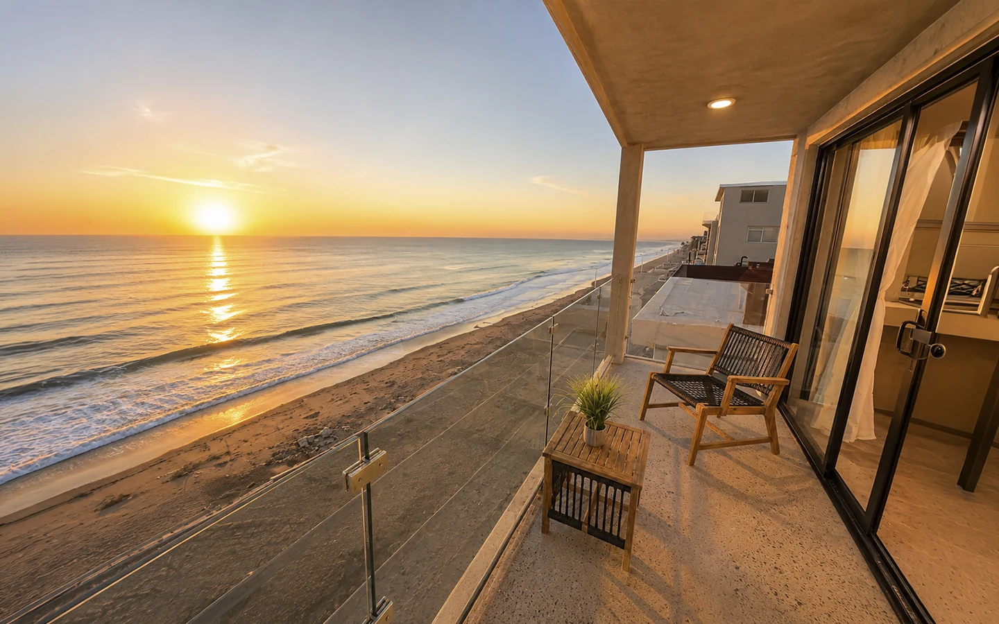 Apartment 3B ocean-facing balcony at sunset
